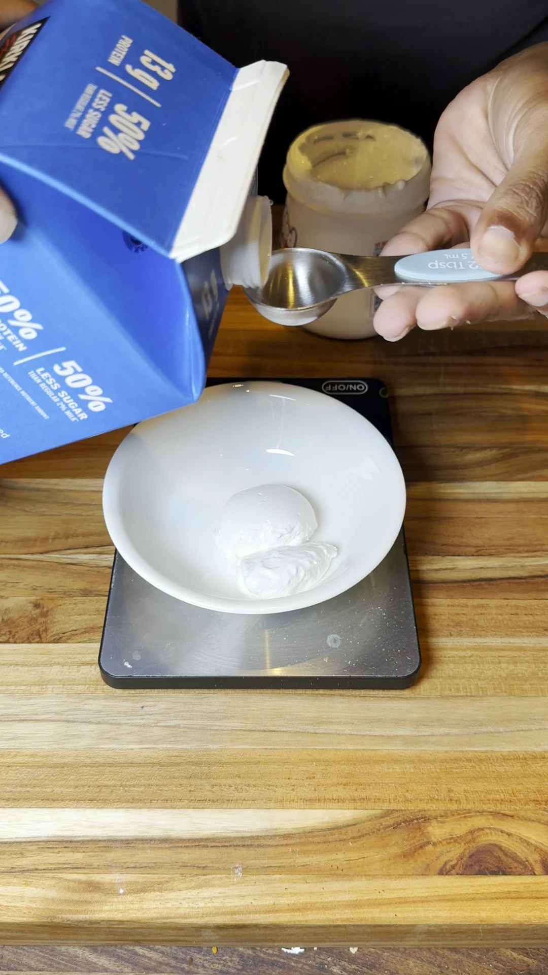 Step photo: add milk to marshmallow