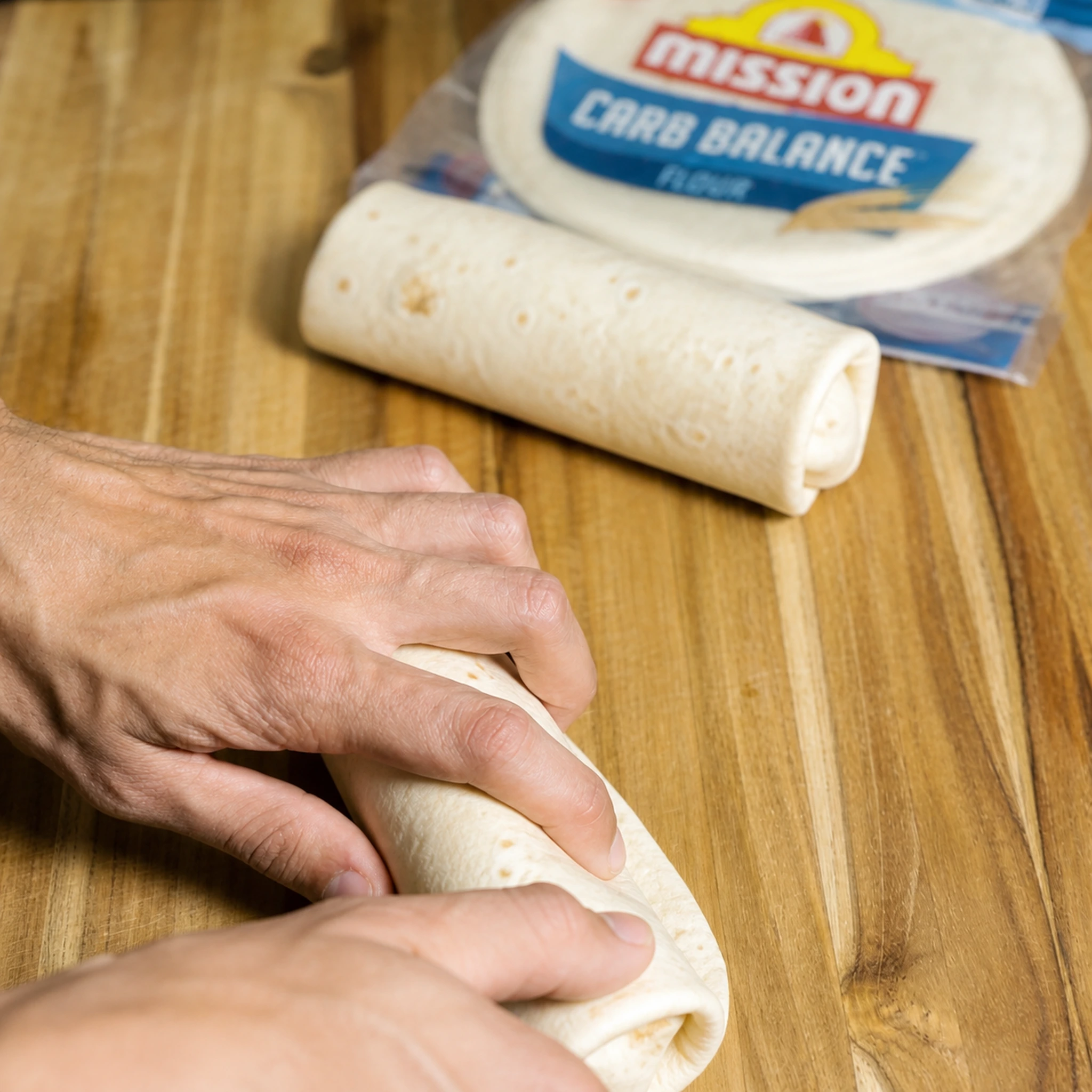 Step photo: roll burritos polished